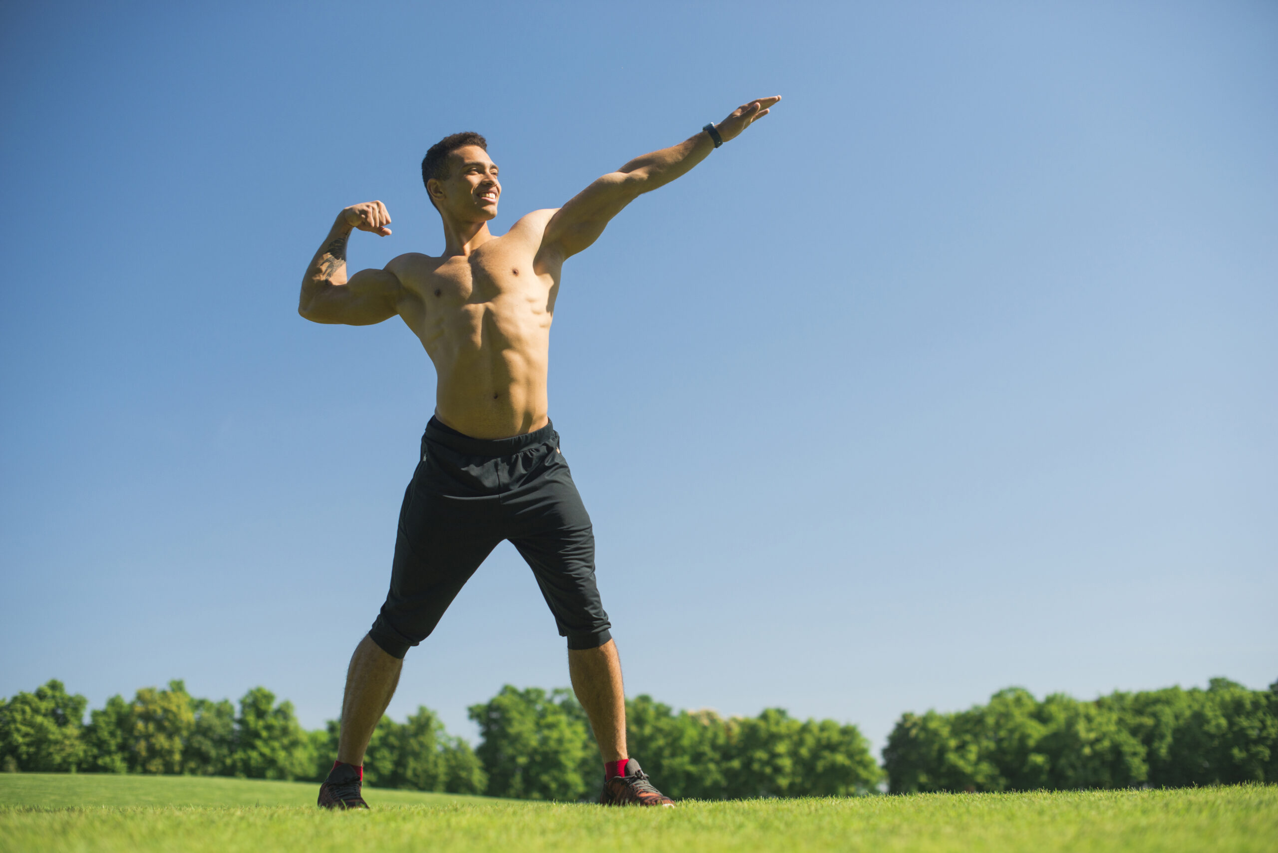 Athlete training outdoors in sunlight, symbolizing the importance of Vitamin D for performance and recovery.